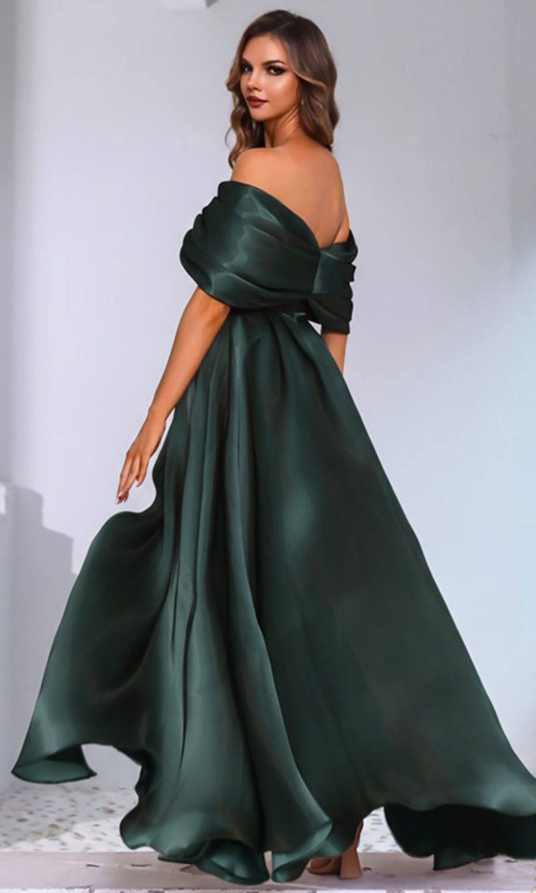 https://cdn.shopify.com/s/files/1/0270/0269/9870/files/terani-couture-251m4044-a-line-skirt-front-slit-evening-gown-dark-green-back.jpg?v=1793192737