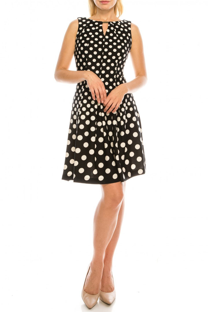 Gabby Skye 19342M Short A Line Dress Polka Dot Prints Sleeveless Front Cutout Pleated Skirt Full Back Back Zipper Closure ADASA