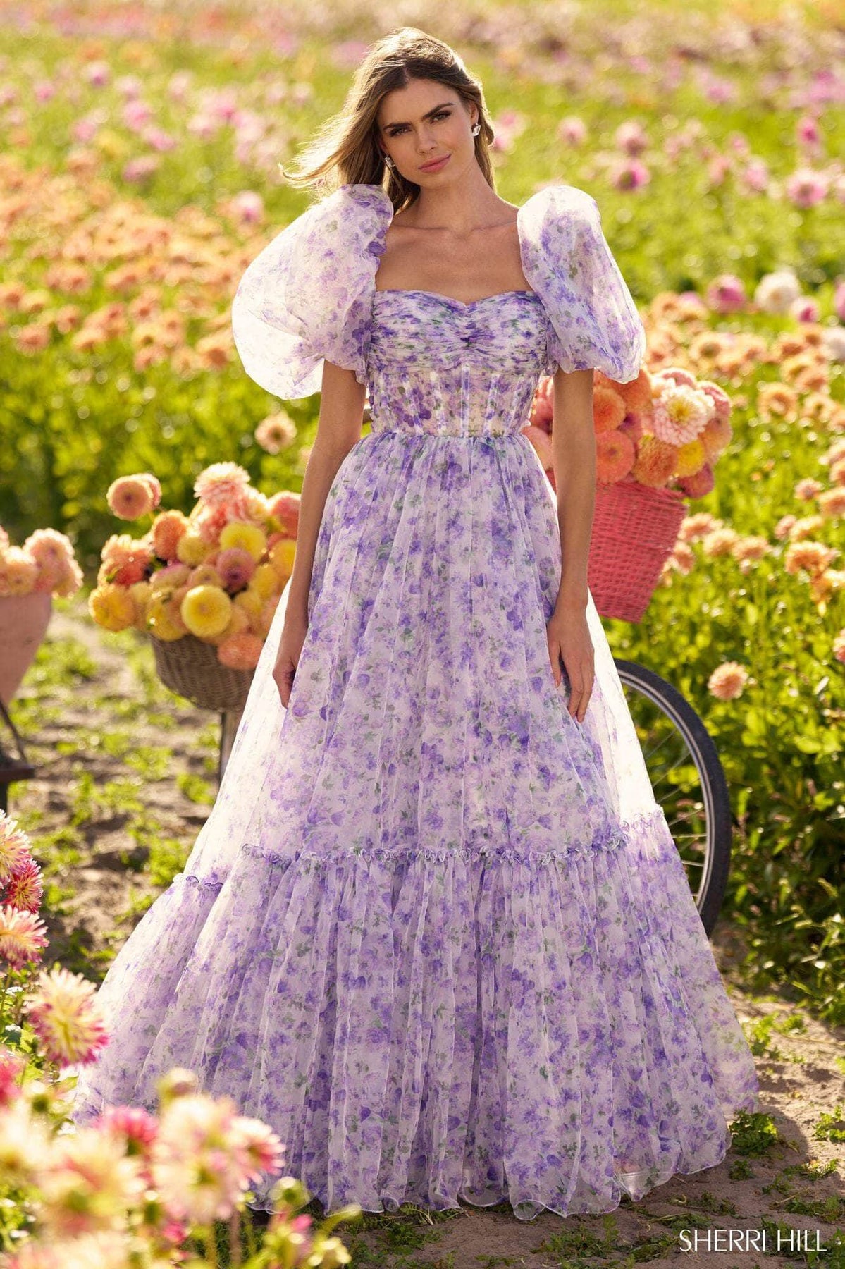 Sherri Hill 56381 - Long Organza A-Line Dress - Floral Print, Balloon Sleeves, Ruched Bust, Sheer Corset Bodice, Open Back with a Tie Strap, Paneled Hem, Sweep Train ADASA Sherri Hill 56381 - Long Organza A-Line Dress - Floral Print, Balloon Sleeves, Ruched Bust, Sheer Corset Bodice, Open Back with a Tie Strap, Paneled Hem, Sweep Train ADASA